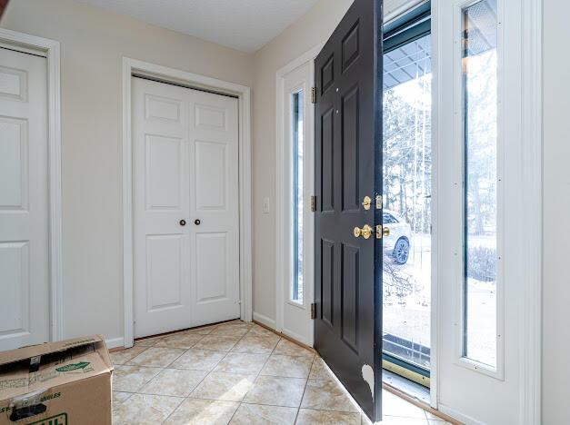 view of tiled entrance foyer