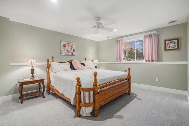 bedroom with ceiling fan and carpet