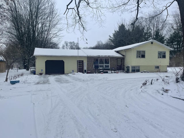 split level home featuring a garage