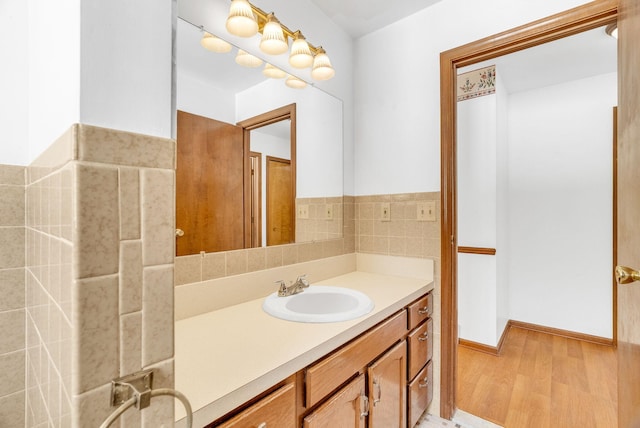 bathroom featuring vanity and hardwood / wood-style flooring