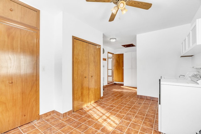 kitchen with ceiling fan, tile patterned floors, and washer and dryer