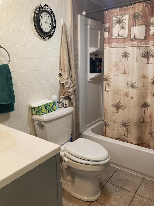 full bathroom with vanity, tile patterned floors, toilet, and shower / bath combo