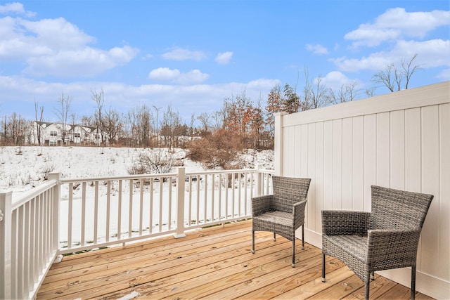 view of snow covered deck