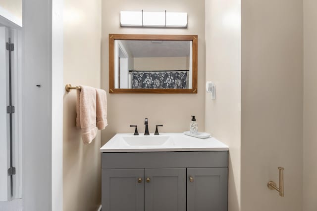 bathroom featuring vanity and walk in shower