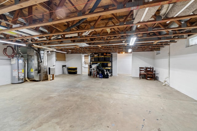 basement with water heater and heating unit