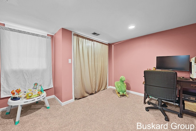 office area featuring carpet, visible vents, and baseboards