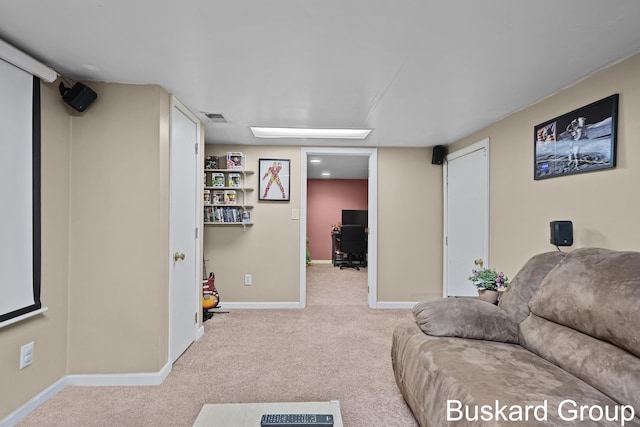 living area featuring carpet, visible vents, and baseboards