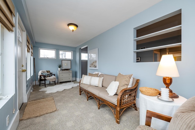 sitting room with carpet flooring