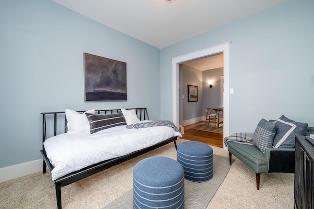 bedroom featuring baseboards