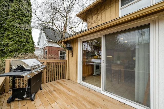 wooden deck with area for grilling