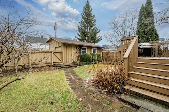 view of yard featuring a gate and fence