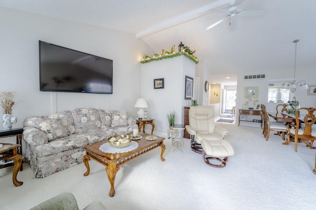 living room with carpet floors, lofted ceiling with beams, and ceiling fan