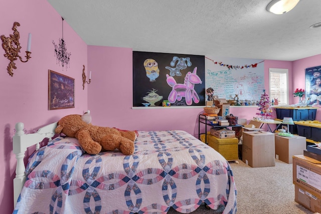 carpeted bedroom with a textured ceiling