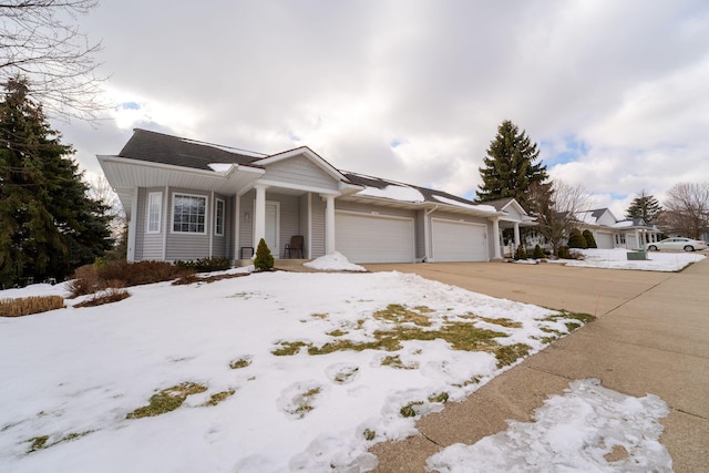 ranch-style home featuring a garage