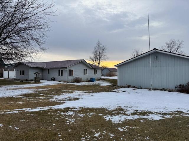 view of snow covered property