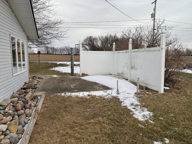 view of yard covered in snow