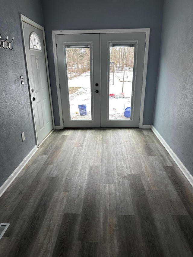 doorway to outside featuring wood-type flooring and french doors