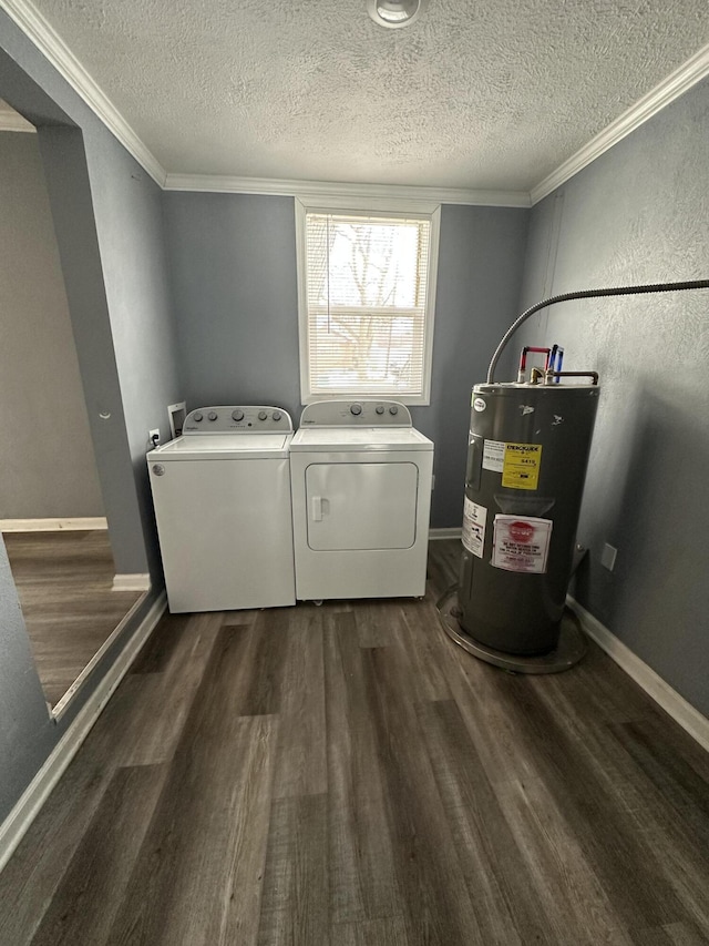 laundry area featuring crown molding, dark wood-type flooring, electric water heater, a textured ceiling, and separate washer and dryer