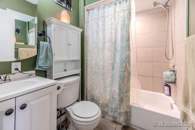 full bathroom featuring vanity, tile patterned floors, toilet, and shower / bathtub combination with curtain