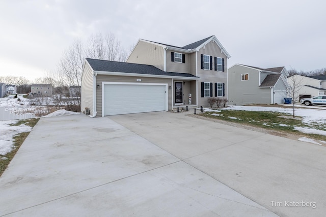 front facade with a garage