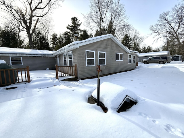 view of snow covered property