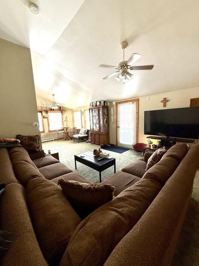 living room with lofted ceiling, ceiling fan, and carpet flooring