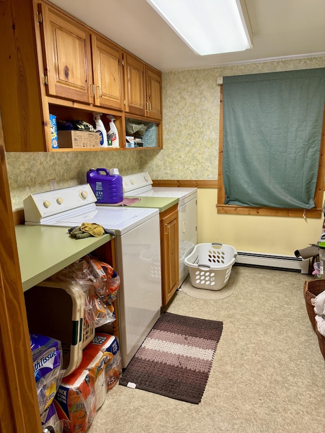 laundry room with washer and clothes dryer, light colored carpet, cabinets, and a baseboard radiator