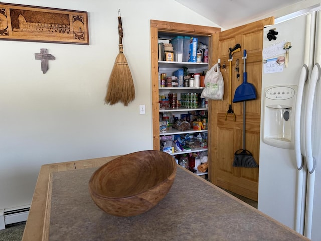 pantry featuring baseboard heating