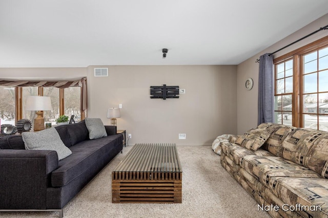 living room with light colored carpet