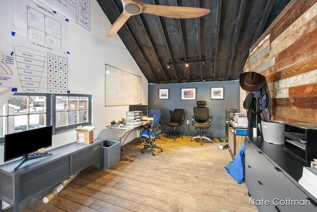 home office featuring high vaulted ceiling and light wood-type flooring