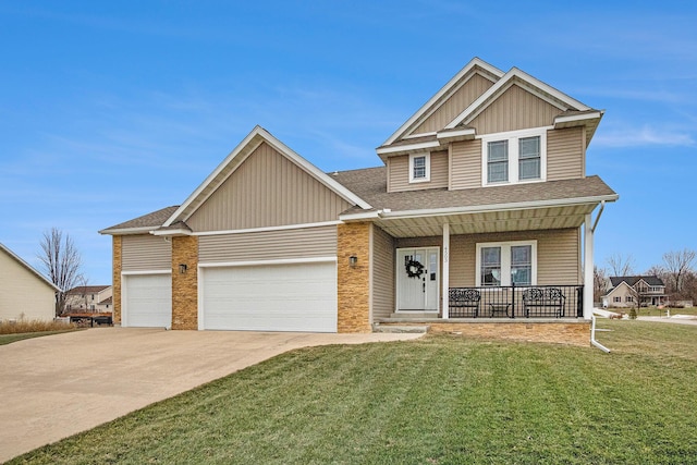 craftsman-style house with a garage, a front yard, and covered porch