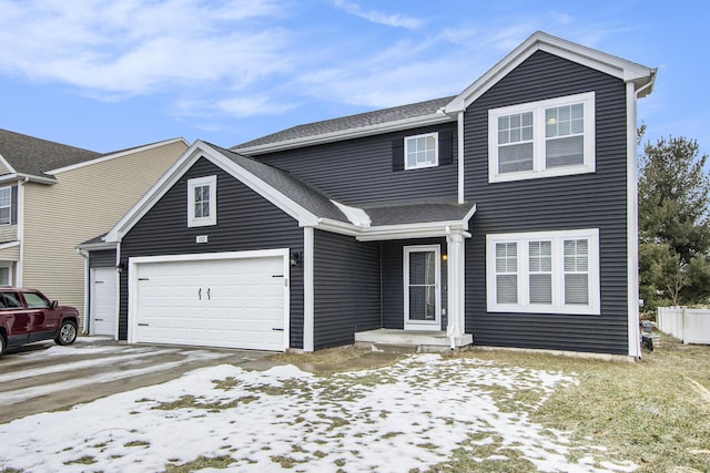 view of front of property with a garage