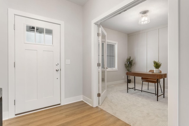 entrance foyer featuring light hardwood / wood-style flooring