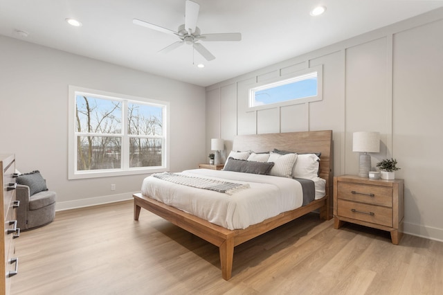 bedroom featuring ceiling fan and light hardwood / wood-style flooring