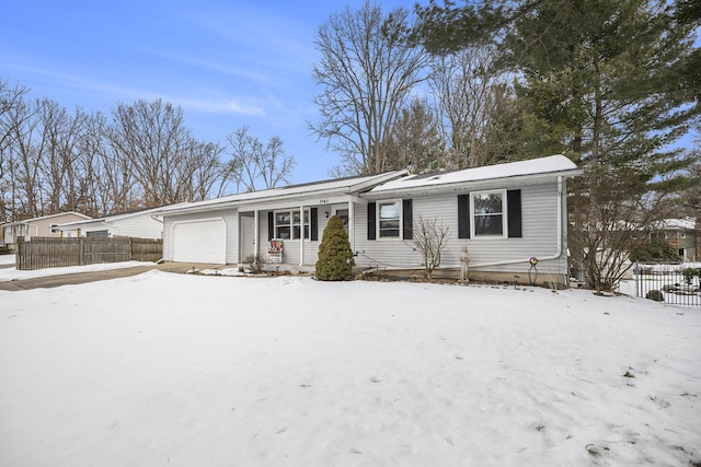 view of front of home with a garage