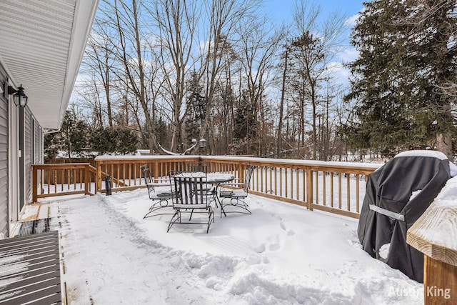 view of snow covered deck