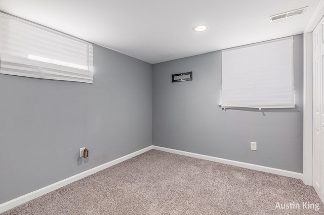 unfurnished room featuring carpet floors