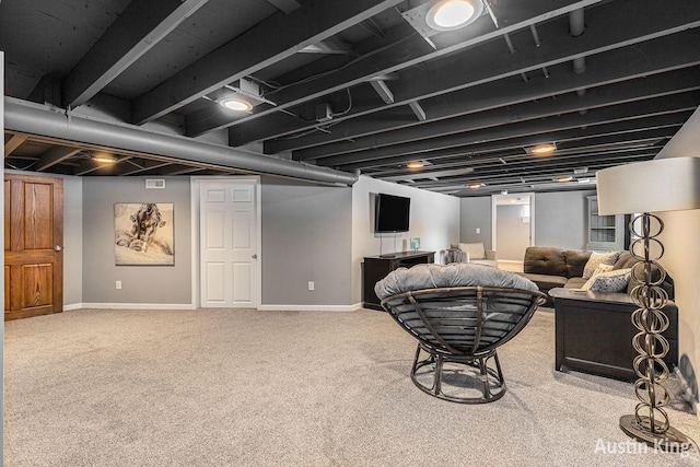 basement featuring carpet flooring