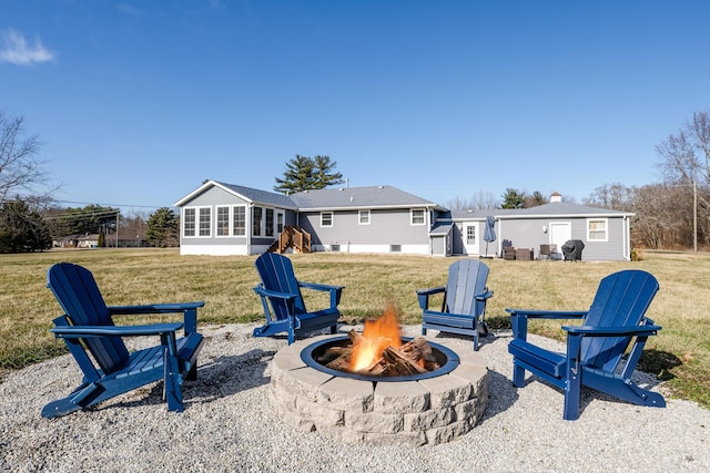 view of yard featuring a fire pit