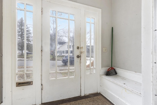 doorway to outside featuring plenty of natural light