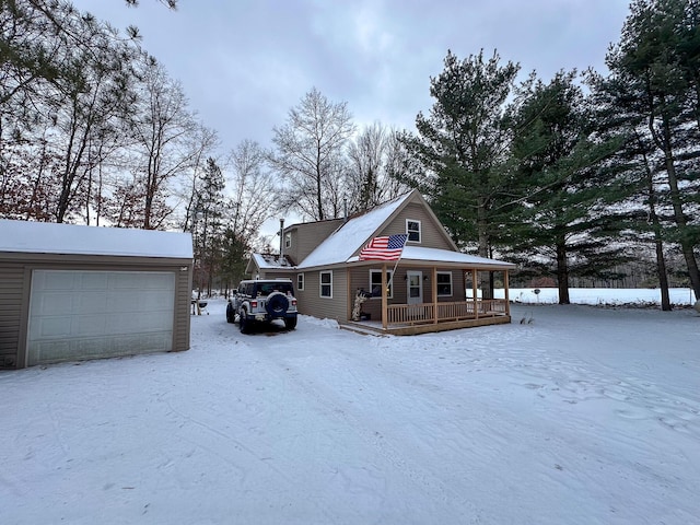 view of front of house featuring a garage and covered porch