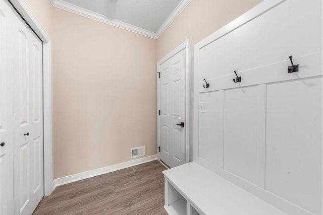 mudroom with hardwood / wood-style flooring and ornamental molding