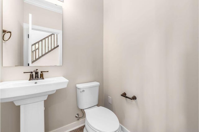 bathroom with sink and toilet