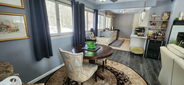 dining room featuring hardwood / wood-style flooring and ceiling fan