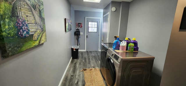 washroom featuring separate washer and dryer and hardwood / wood-style floors