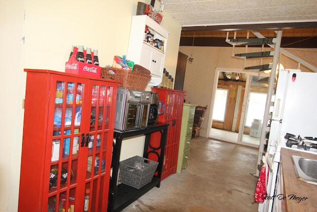 kitchen featuring concrete floors