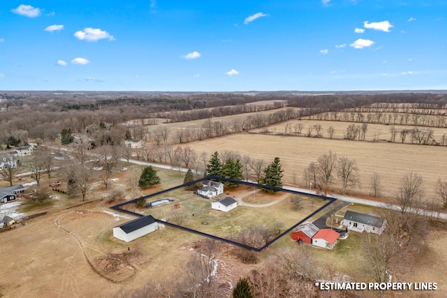 birds eye view of property featuring a rural view