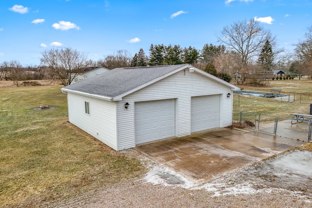 garage with a lawn