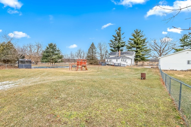 view of yard with a playground