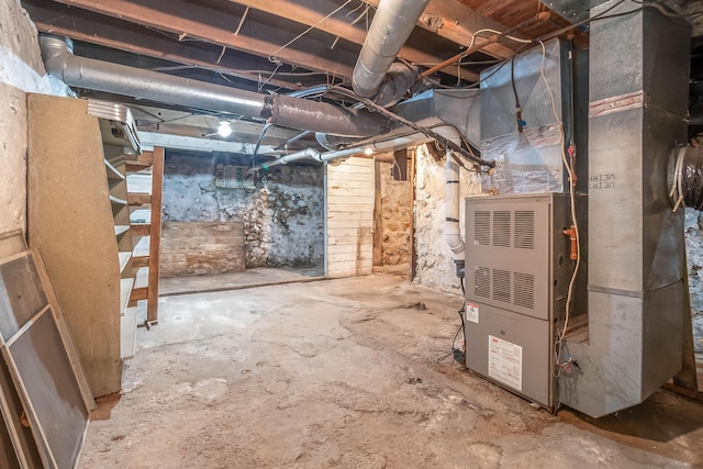 basement featuring heating unit